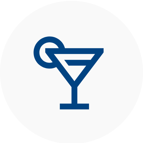 Blue martini glass icon on a white background to represent Bars and Clubs