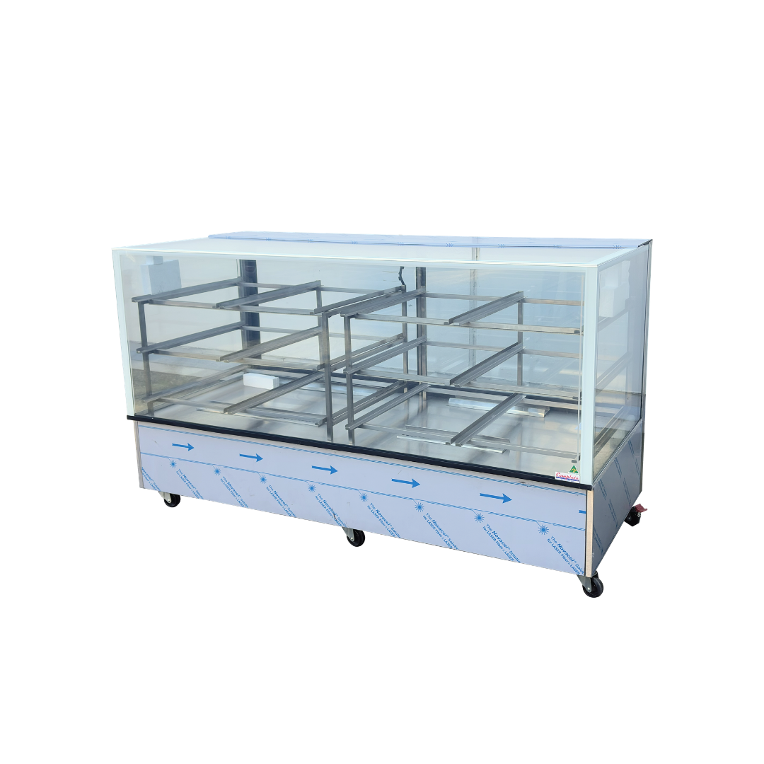 A commercial glass display case with  metal shelves holds 400 x 600mm trays and wires for bakery, cafe and cake display 