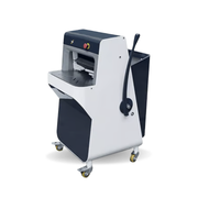 View of Paramount Mano-1P Series Manual Floor model Bread Slicer with traction lever on loaf pusher and movable on casters. Premium bakery equipment.