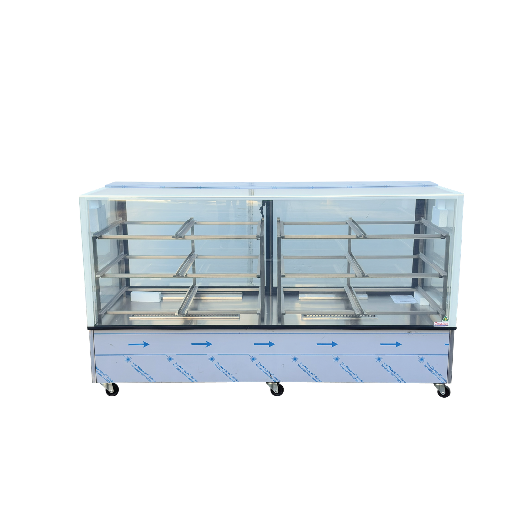 As new, commercial two-door glass display case cake fridge with stainless steel shelves for cold food and desserts in a bakery or cafe shop